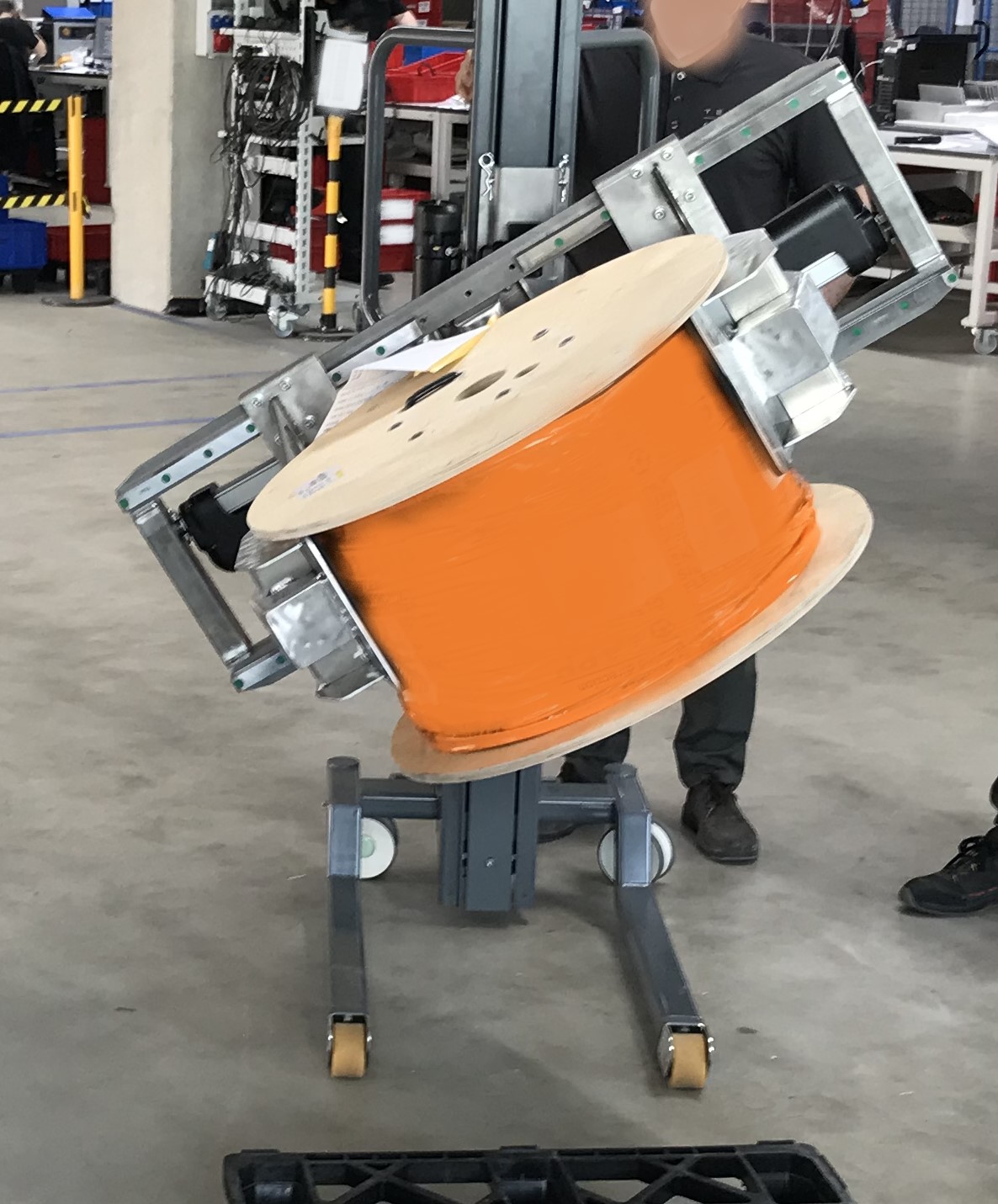 Pick up rolls, coils and cable drums safely
