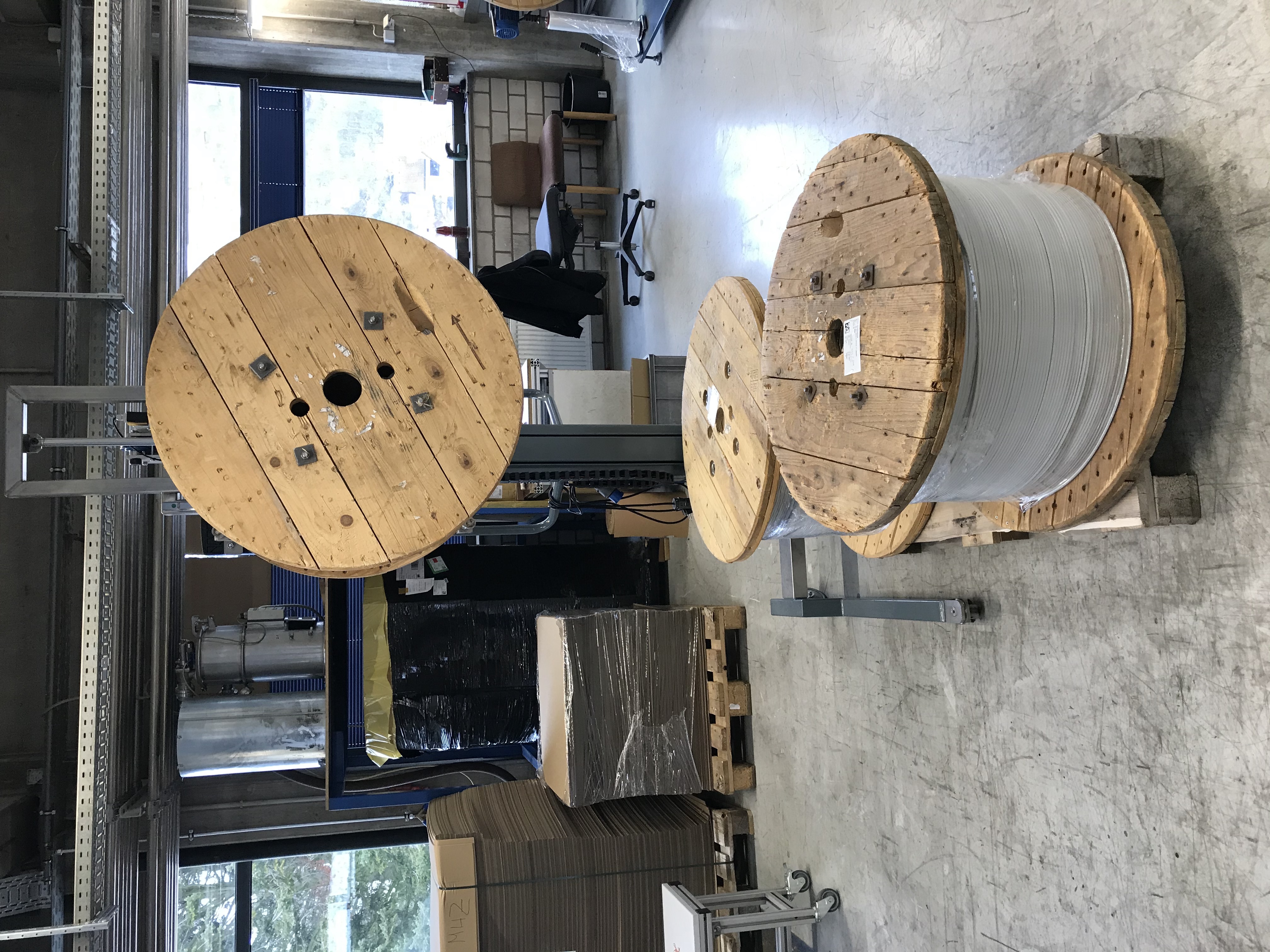 Pick up rolls, coils and cable drums safely