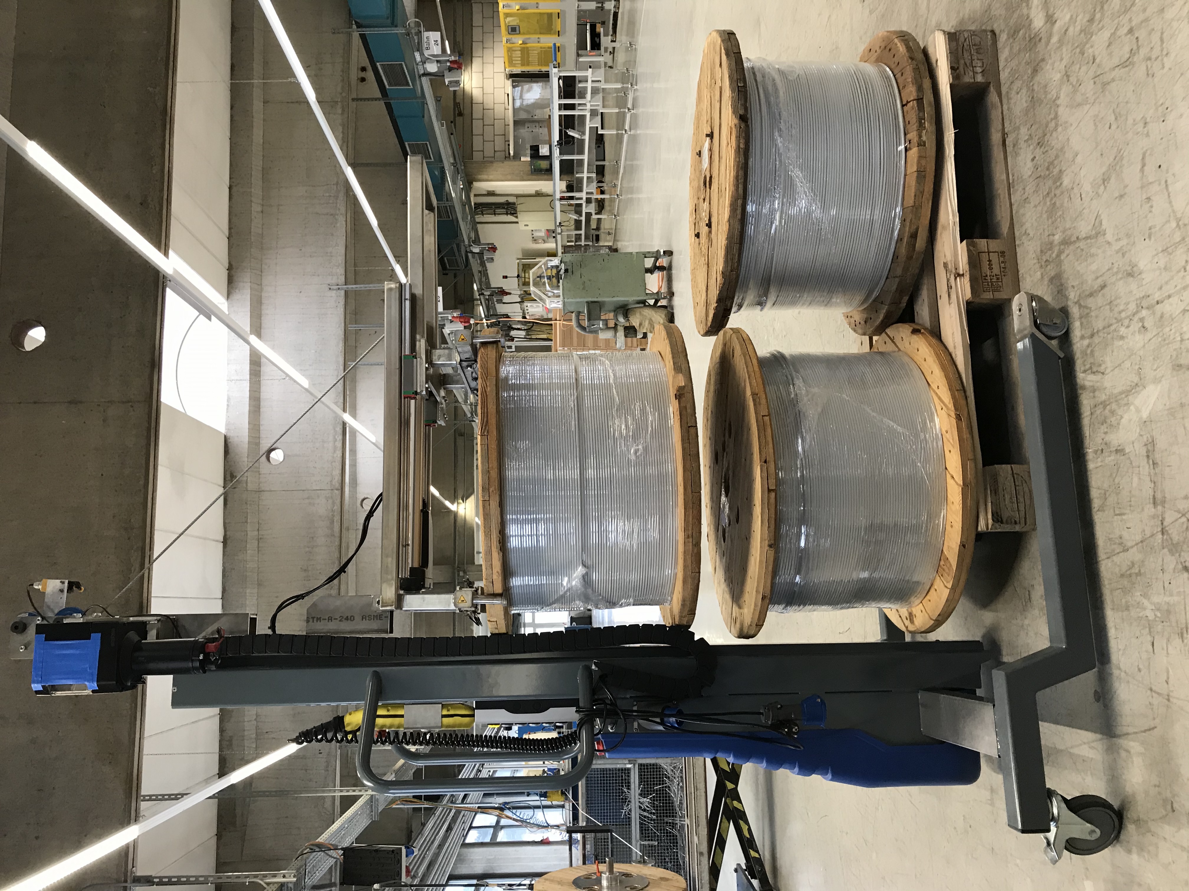 Pick up rolls, coils and cable drums safely
